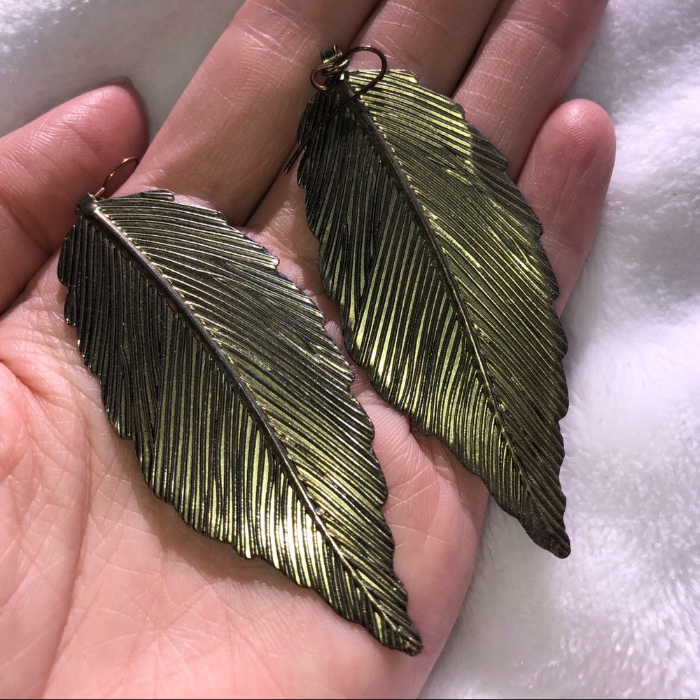 Aged gold leaf earrings.